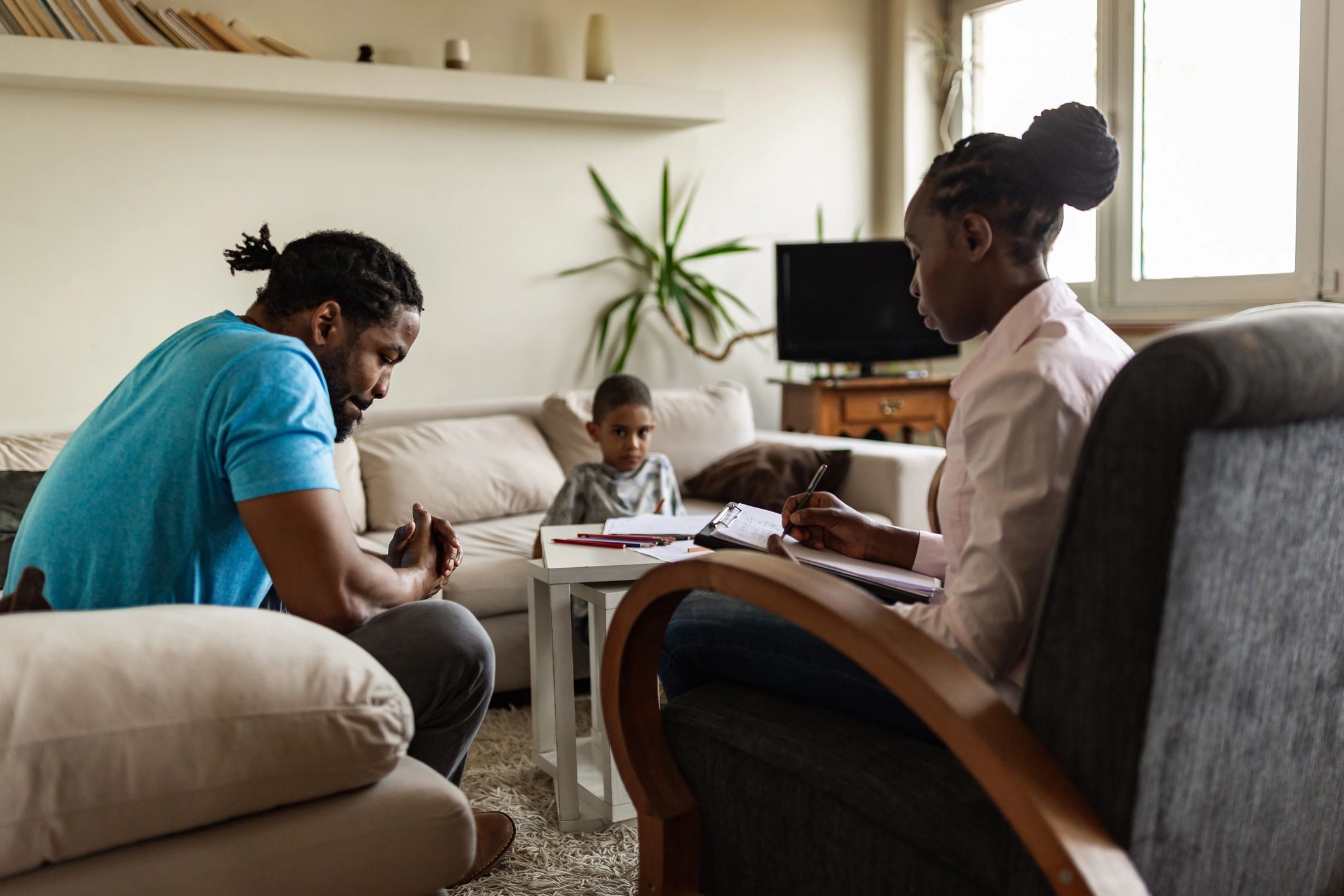 Family seated together during a supportive conversation
